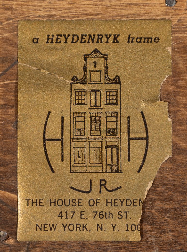A worn gold-coloured Heydenryk frame maker’s label is affixed to the wooden frame. It bears a drawing of a narrow house and a New York address; tears across the label and along its right edge obscure some printing.