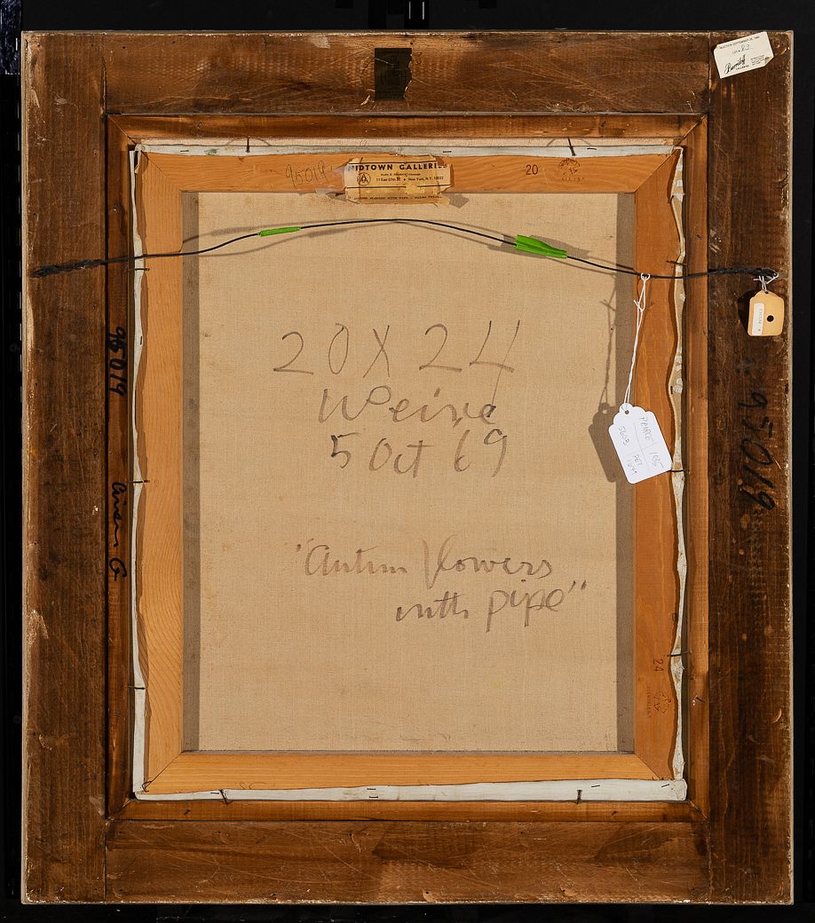 Reverse of a framed canvas, showing the exposed wooden stretcher and broad dark-brown frame, a wire hanger, and several attached paper labels and tags. Large pencil inscriptions on the canvas include “20 x 24,” “Peirce,” “Sept 69,” and the title “Autumn Flowers with pipe”; a Midtown Galleries label is affixed to the upper stretcher.